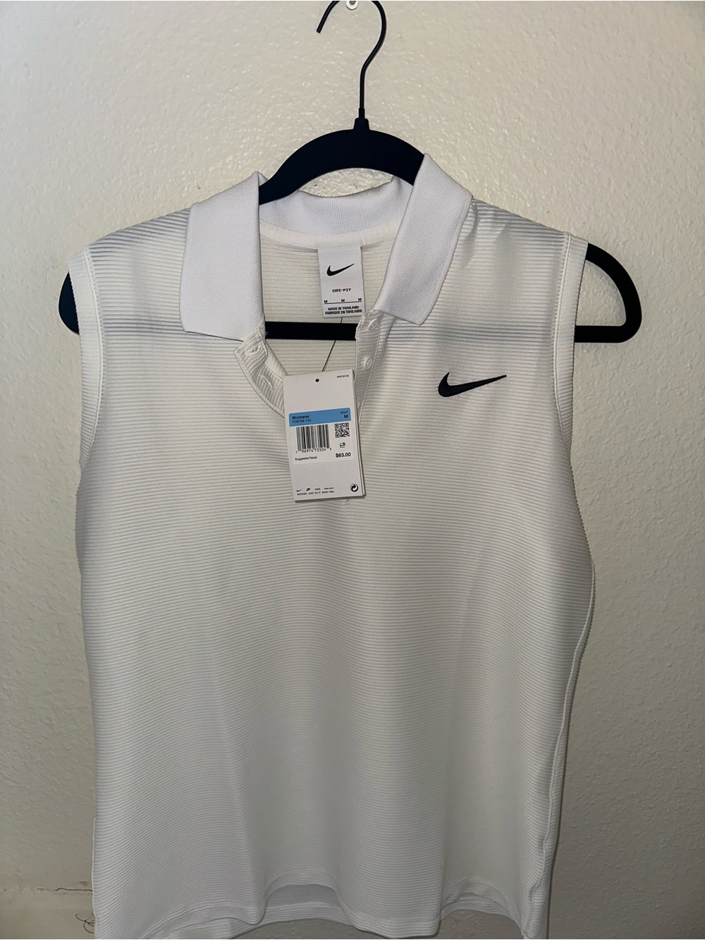 Nike White Sleeveless Polo with Black Swoosh